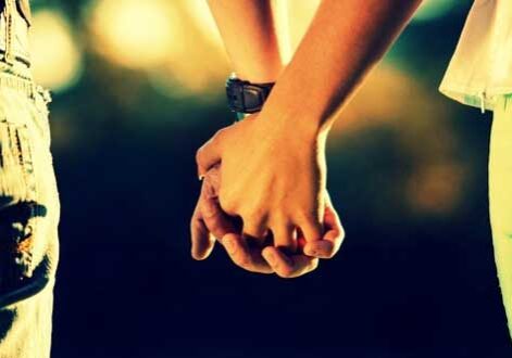 Couple holding hands