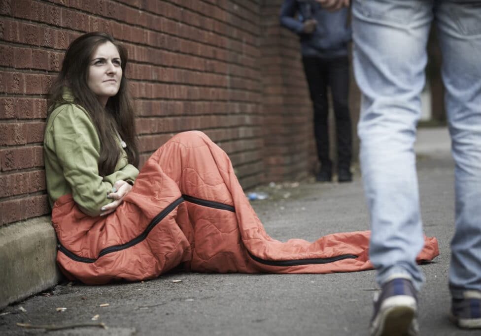 Vulnerable Teenage Girl Sleeping On The Street